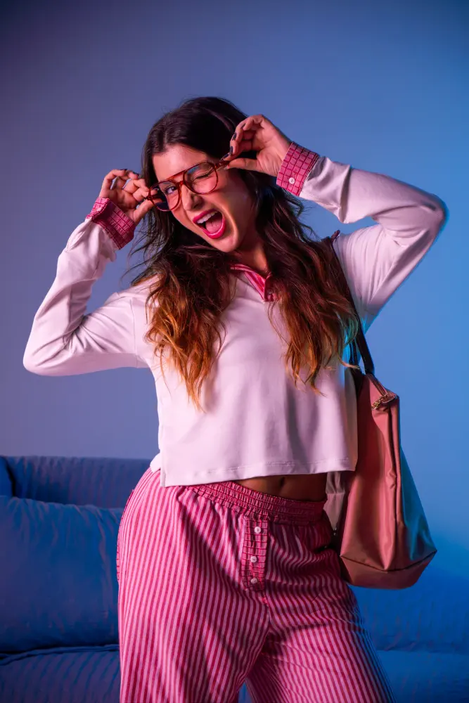 Model wearing a pink Frambô set during the photo shoot.